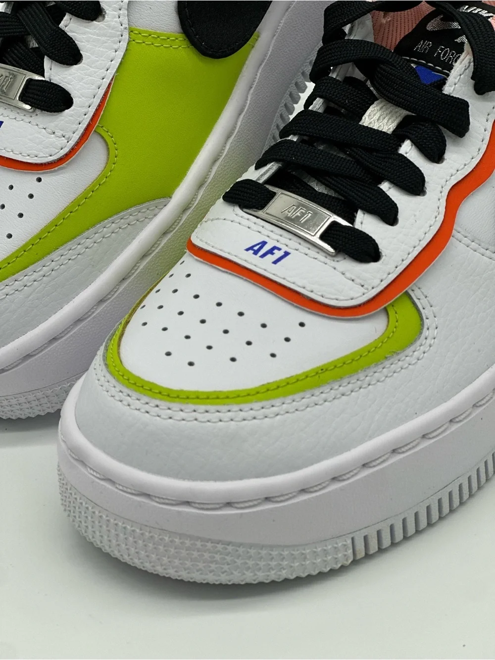 Nike Women's White Sneakers with Black, Neon Green & Pink Accents